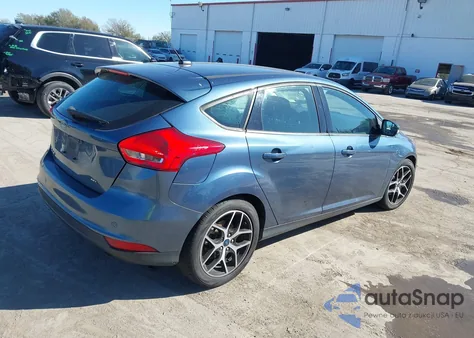 2018 Ford Focus Sel z USA, uszkodzony, nr VIN 1FADP3M25JL275587